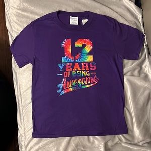 12 year old birthday T-shirt – 12 years of being awesome – purple short sleeved